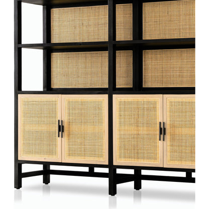 Caprice Wide Bookshelf by Four Hands in natural mango, gunmetal, natural cane and natural mango. Made from solid mango, iron in a modern style.