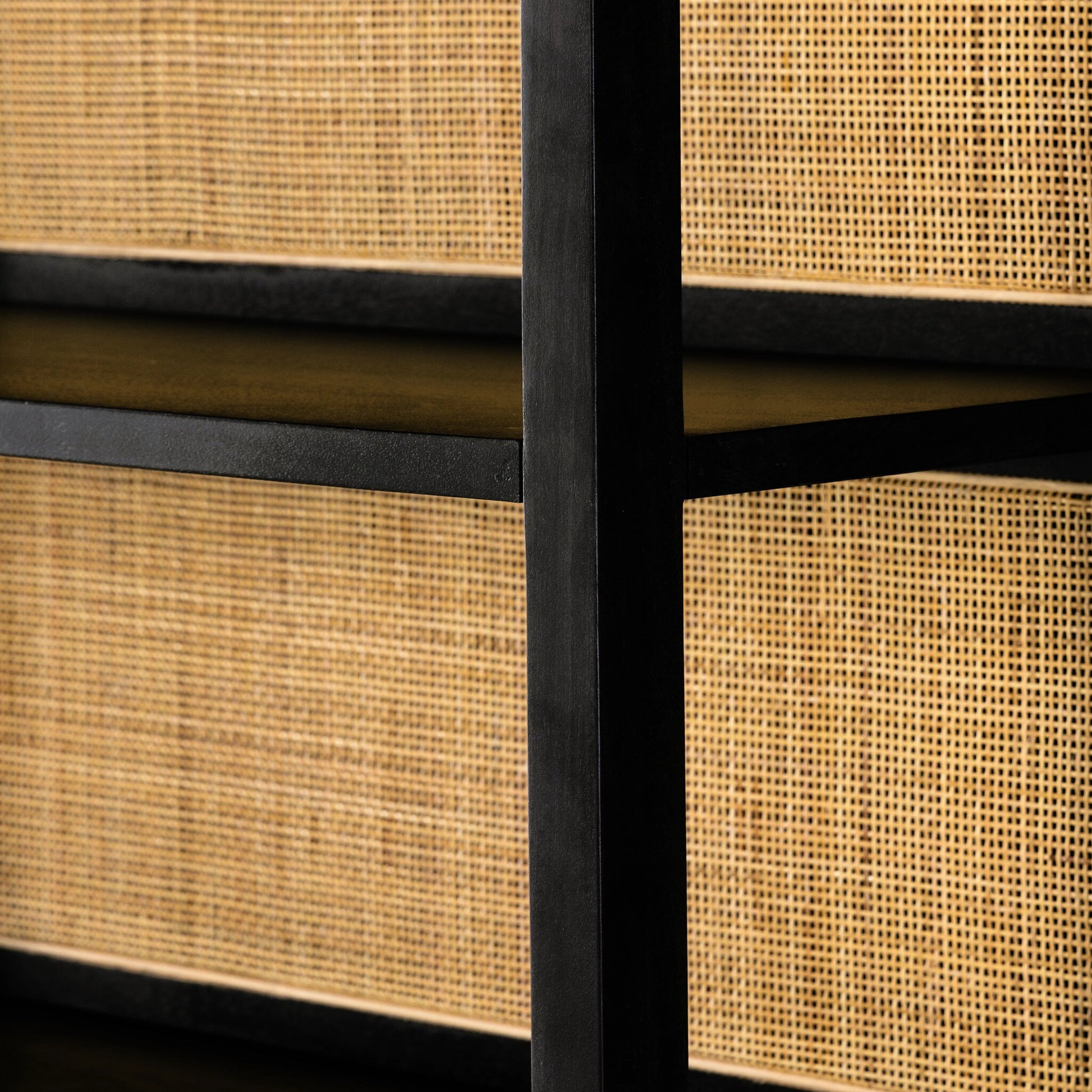 Caprice Wide Bookshelf by Four Hands in natural mango, gunmetal, natural cane and natural mango. Made from solid mango, iron in a modern style.
