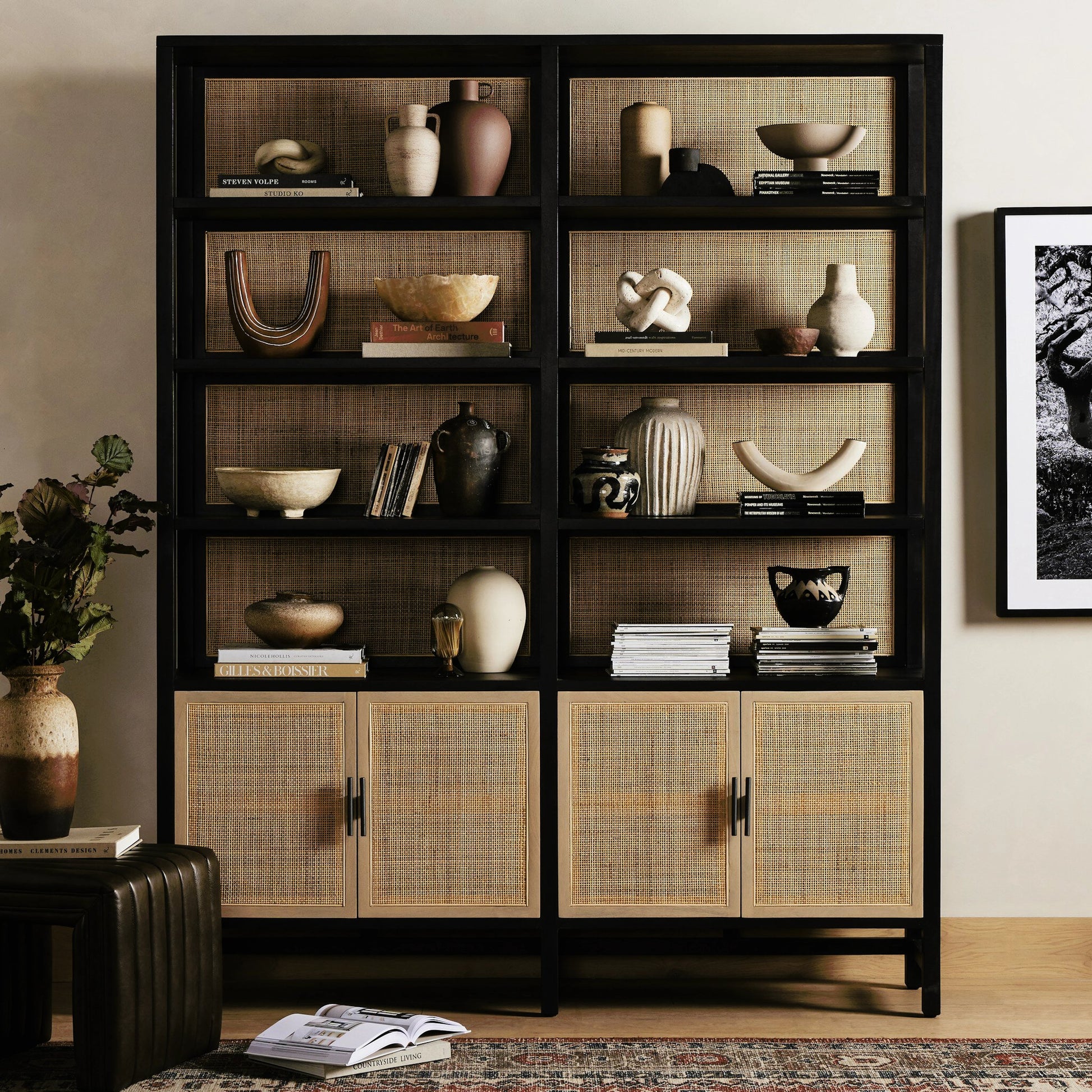 Caprice Wide Bookshelf by Four Hands in natural mango, gunmetal, natural cane and natural mango. Made from solid mango, iron in a modern style.