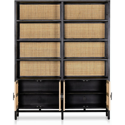 Caprice Wide Bookshelf by Four Hands in natural mango, gunmetal, natural cane and natural mango. Made from solid mango, iron in a modern style.