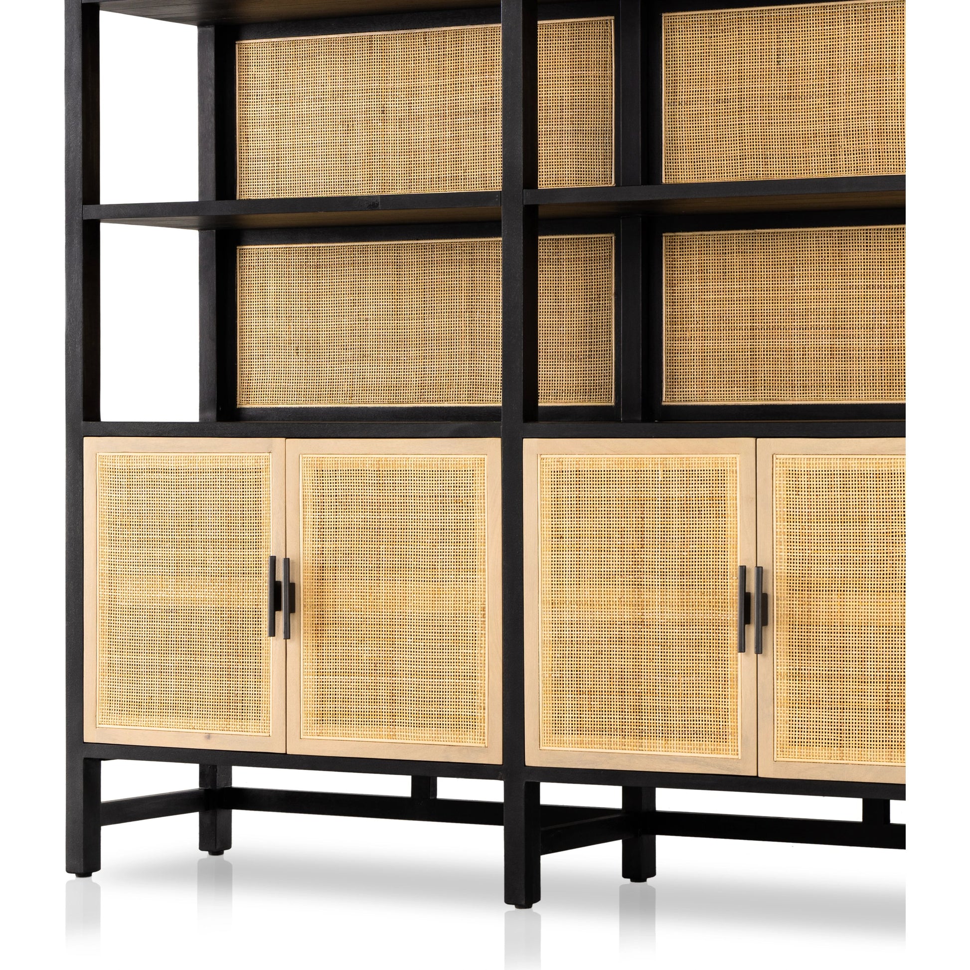 Caprice Wide Bookshelf by Four Hands in natural mango, gunmetal, natural cane and natural mango. Made from solid mango, iron in a modern style.