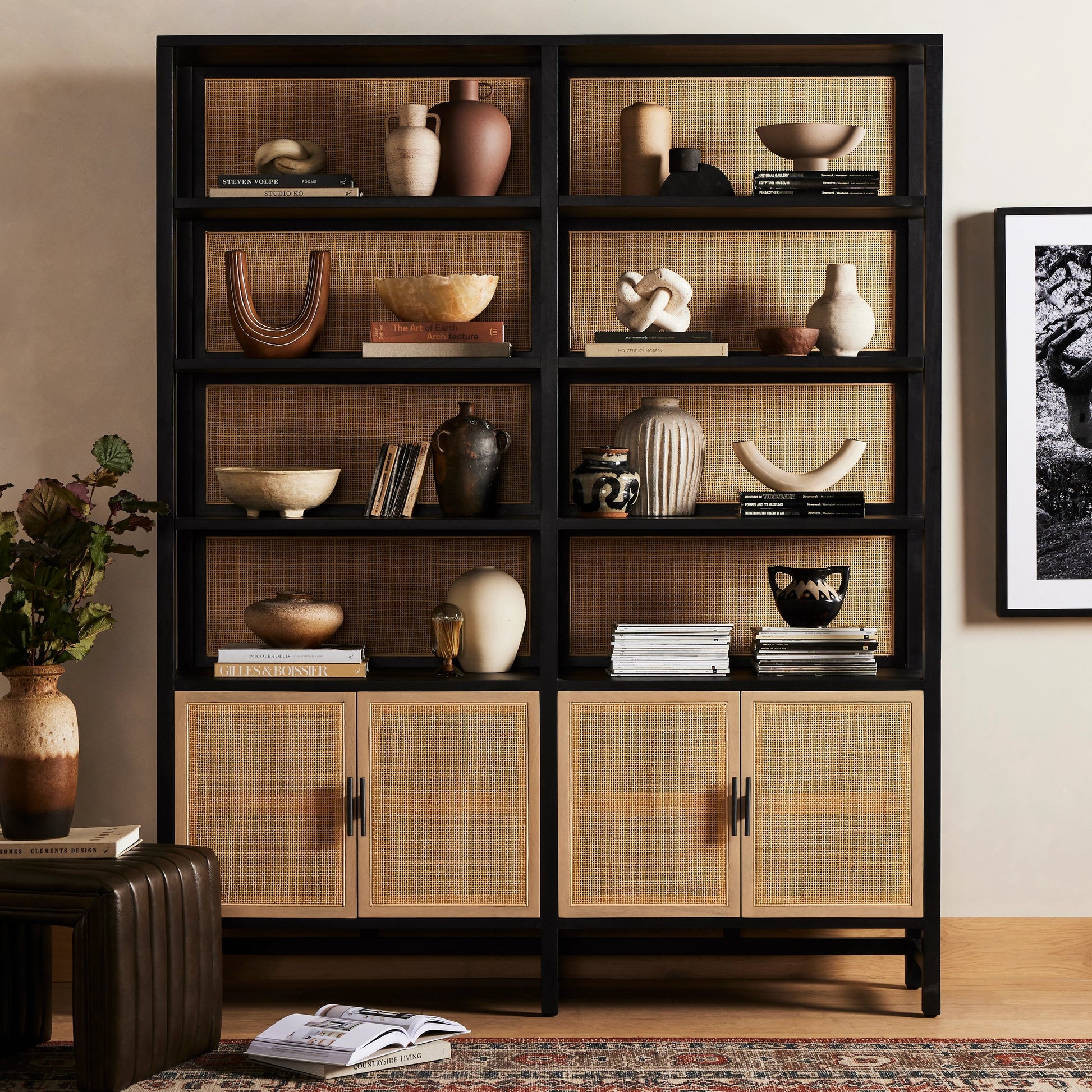 Caprice Wide Bookshelf by Four Hands in natural mango, gunmetal, natural cane and natural mango. Made from solid mango, iron in a modern style.