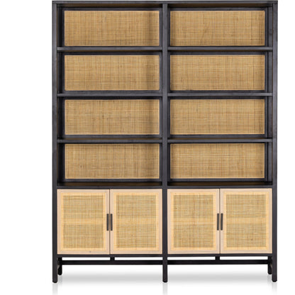 Caprice Wide Bookshelf by Four Hands in natural mango, gunmetal, natural cane and natural mango. Made from solid mango, iron in a modern style.