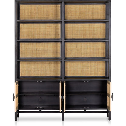 Caprice Wide Bookshelf by Four Hands in natural mango, gunmetal, natural cane and natural mango. Made from solid mango, iron in a modern style.