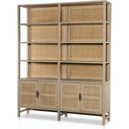 Caprice Wide Bookshelf by Four Hands in natural mango, gunmetal, natural cane and natural mango. Made from solid mango, iron in a modern style.