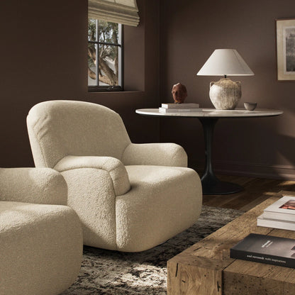 Kadon Chair by Four Hands in sheepskin camel, almond. Made from 100% polyester, solid parawood, 100% polypropylene in a transitional style.