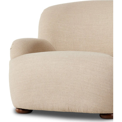 Kadon Chair by Four Hands in sheepskin camel, almond. Made from 100% polyester, solid parawood, 100% polypropylene in a transitional style.