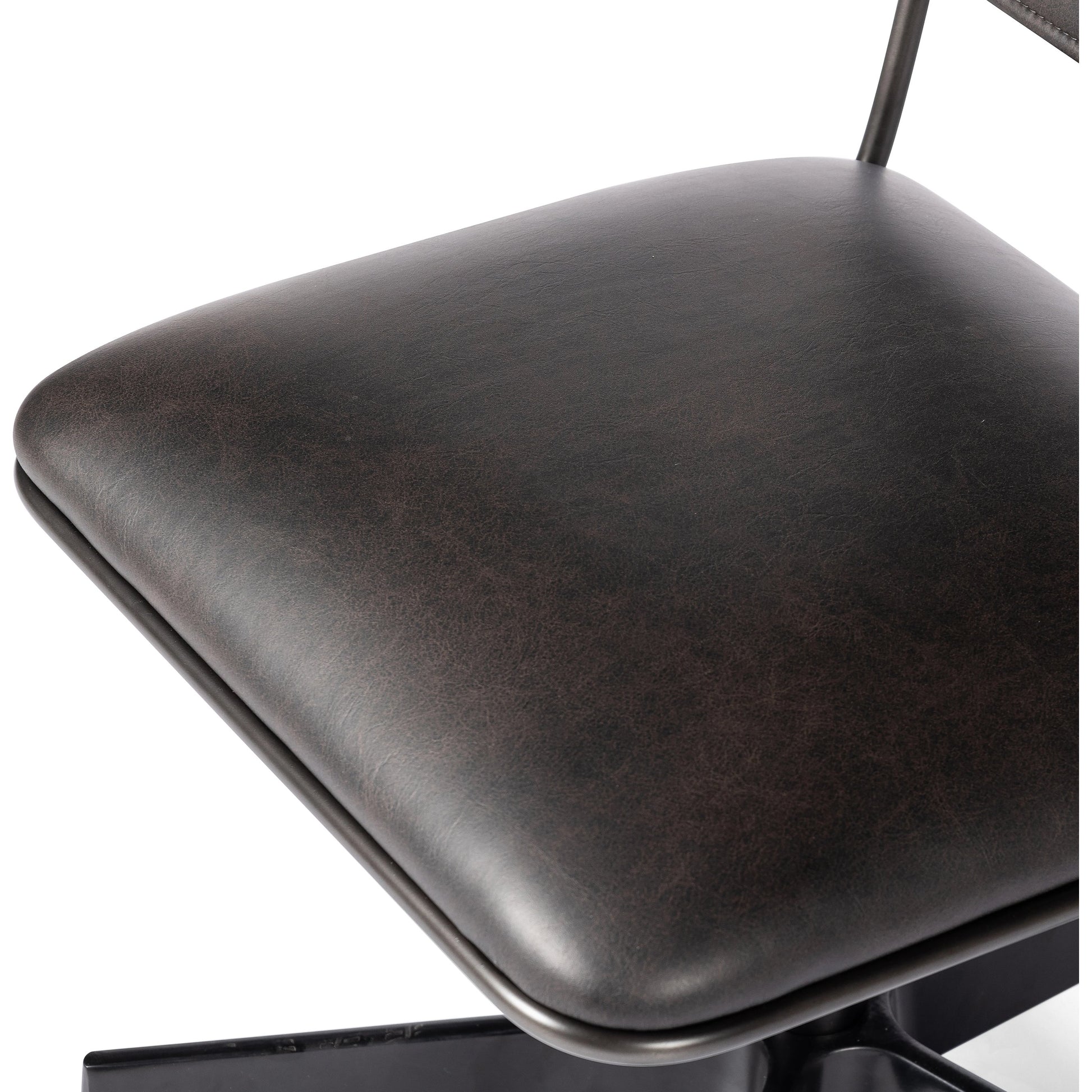 Wharton Desk Chair by Four Hands in distressed brown. Made from faux leather, iron in a modern style.