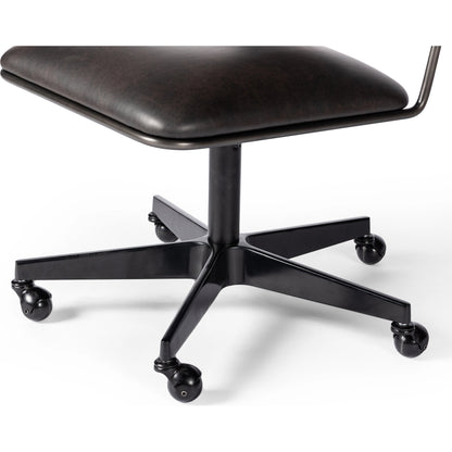 Wharton Desk Chair by Four Hands in distressed brown. Made from faux leather, iron in a modern style.