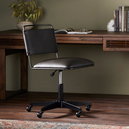 Wharton Desk Chair by Four Hands in distressed brown. Made from faux leather, iron in a modern style.