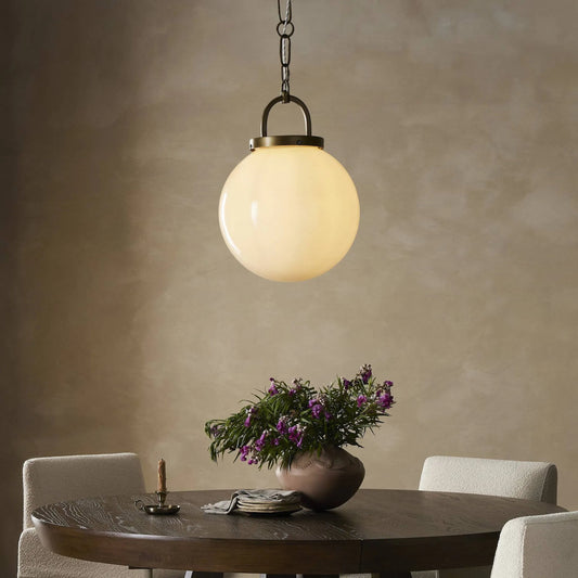 Evelie Pendant by Four Hands in painted glass, light antique brass. Made from glass, iron in a unique style.