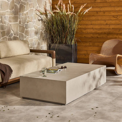 Otero Rectangular Outdoor Coffee Table by Four Hands. Made from concrete in a modern style.