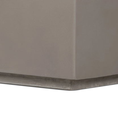 Otero Rectangular Outdoor Coffee Table by Four Hands. Made from concrete in a modern style.