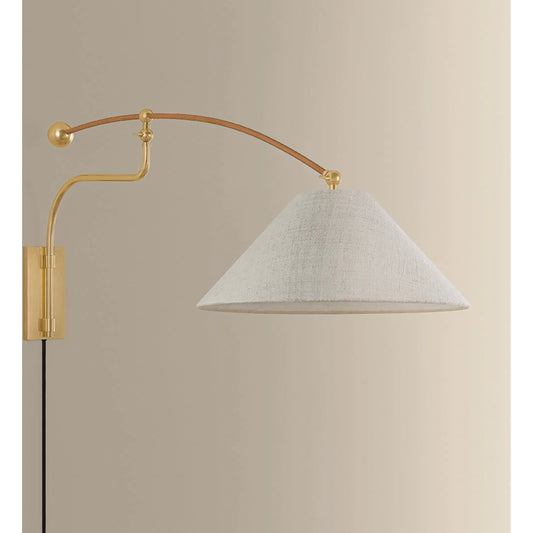 Sylva Wall Sconce by Hudson Valley in aged brass. Made from natural woven in a unique style.