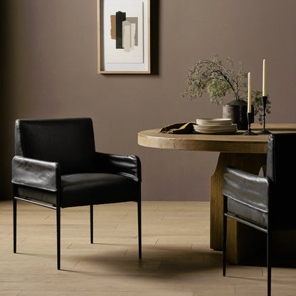 Brickel Dining Armchair by Four Hands in light taupe. Made from 100% polyester, iron, 93% polyurethane foam pad, 7% polyester fiber batting in a modern style.