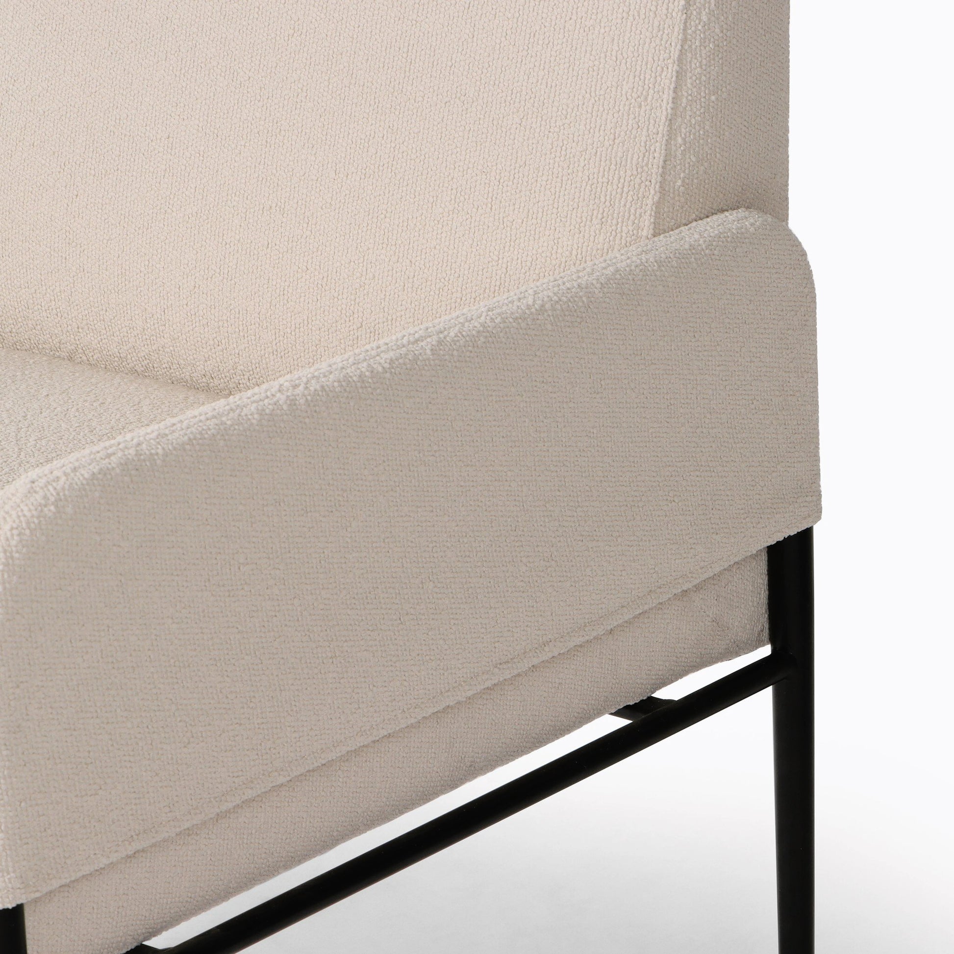 Brickel Dining Armchair by Four Hands in light taupe. Made from 100% polyester, iron, 93% polyurethane foam pad, 7% polyester fiber batting in a modern style.