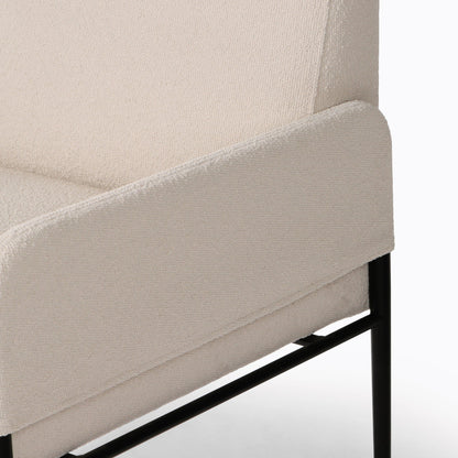 Brickel Dining Armchair by Four Hands in light taupe. Made from 100% polyester, iron, 93% polyurethane foam pad, 7% polyester fiber batting in a modern style.