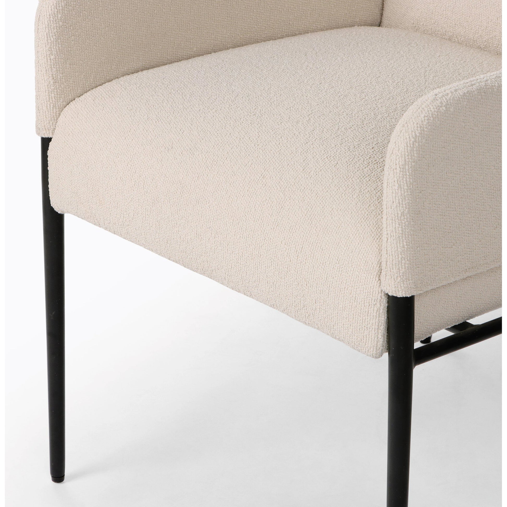 Brickel Dining Armchair by Four Hands in light taupe. Made from 100% polyester, iron, 93% polyurethane foam pad, 7% polyester fiber batting in a modern style.
