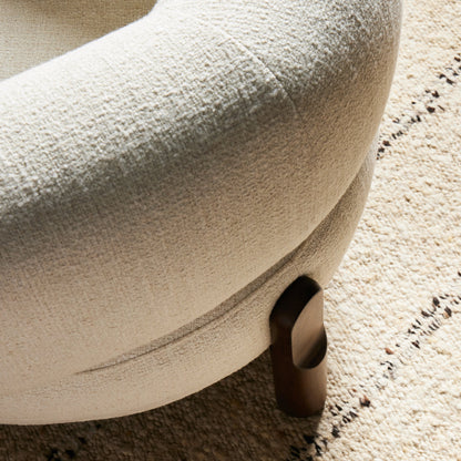 Kingston Chair by Four Hands in omari natural and terra brown parawood. Made from 79% polyester, 16% viscose (rayon), 5% flax, linen, solid parawood, 90% polyurethane foam, 10% fiber in a modern style.