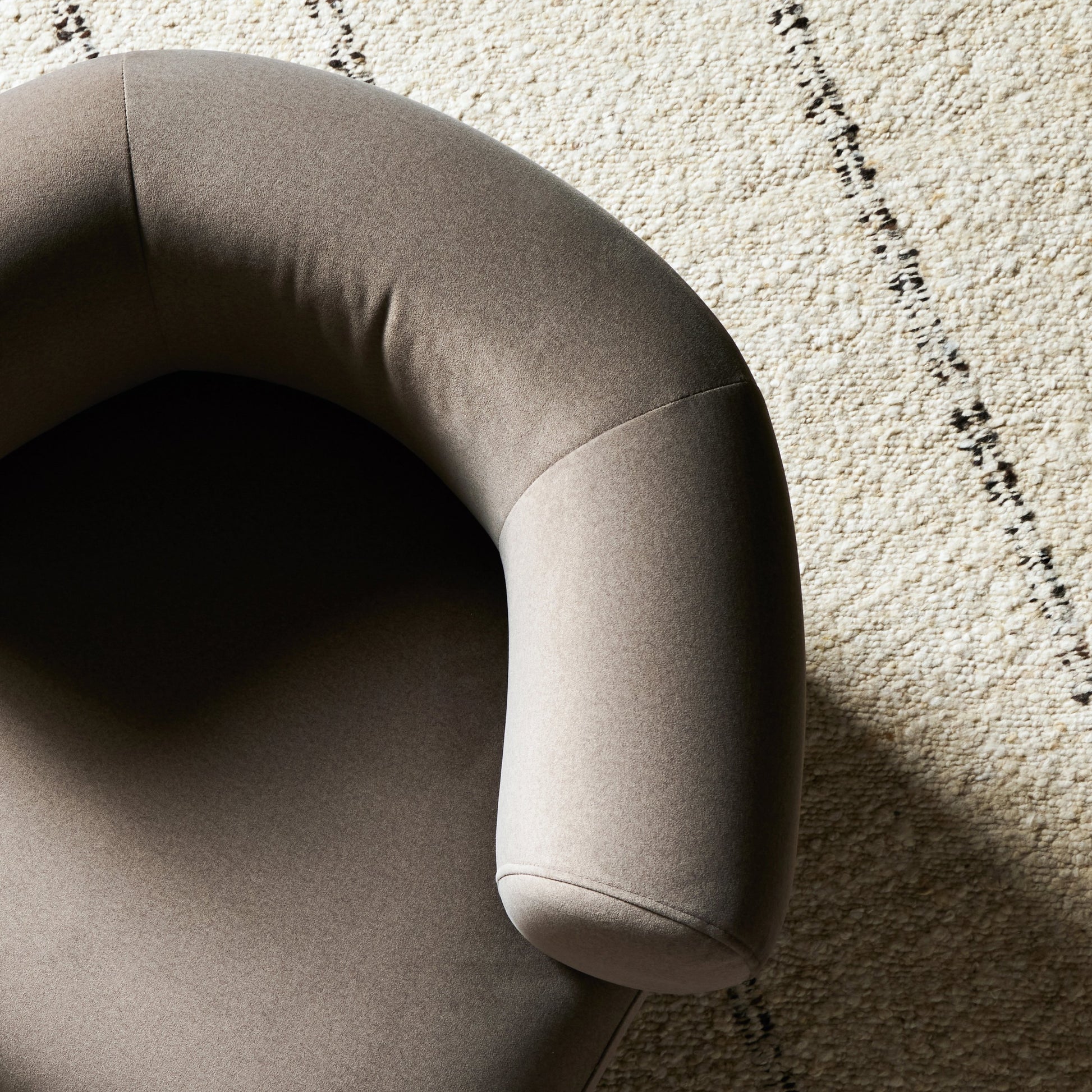 Kingston Chair by Four Hands in omari natural and terra brown parawood. Made from 79% polyester, 16% viscose (rayon), 5% flax, linen, solid parawood, 90% polyurethane foam, 10% fiber in a modern style.