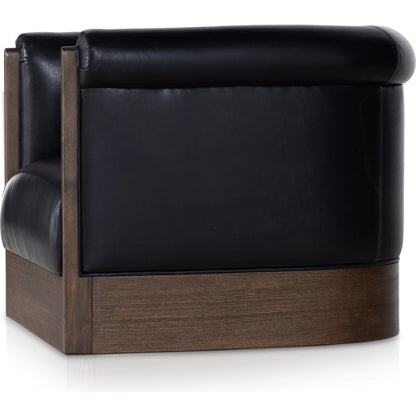 Colby Swivel Chair by Four Hands in vintage ash veneer, heirloom black, vintage ash. Made from top grain leather, ash veneer, solid ash in a modern style.
