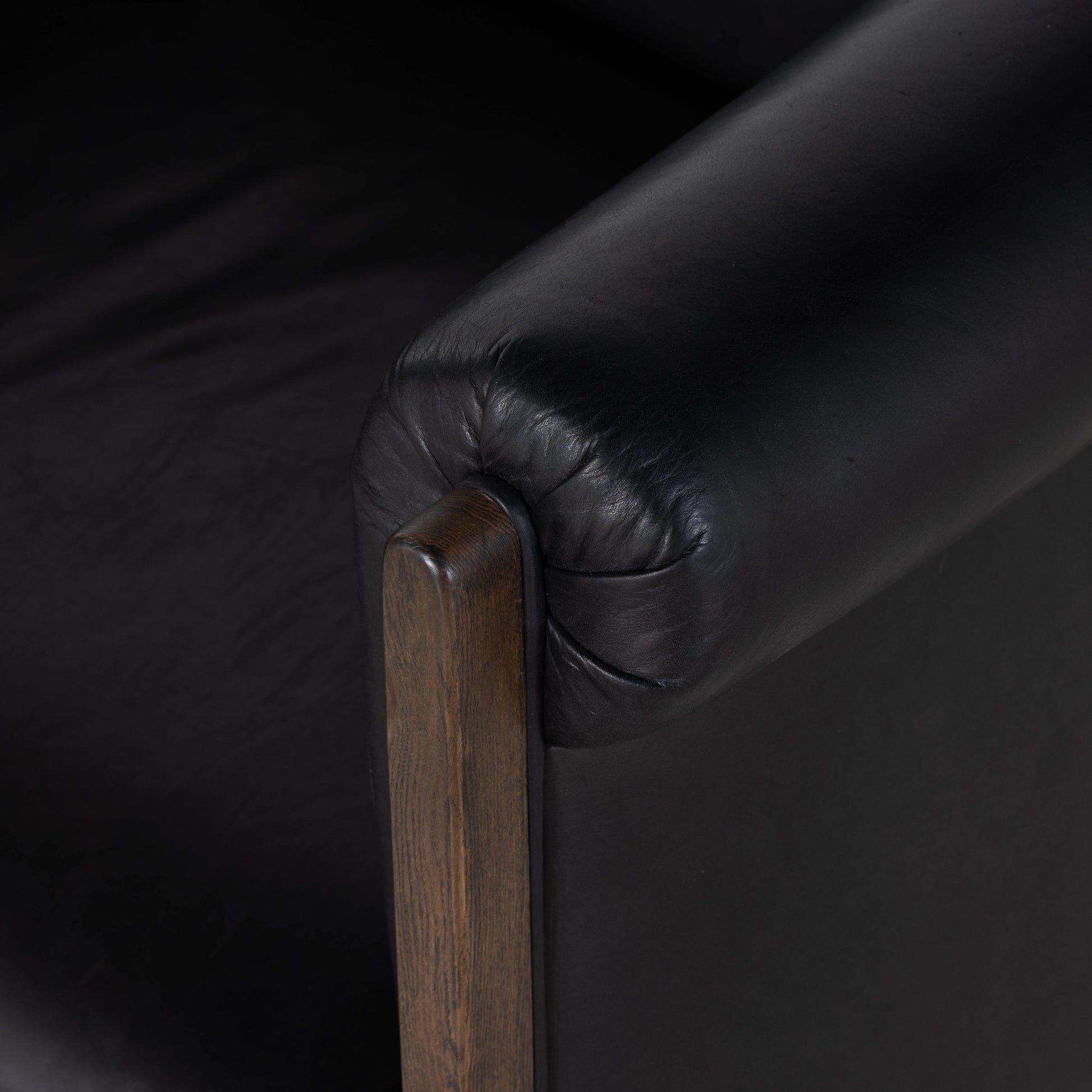 Colby Swivel Chair by Four Hands in vintage ash veneer, heirloom black, vintage ash. Made from top grain leather, ash veneer, solid ash in a modern style.