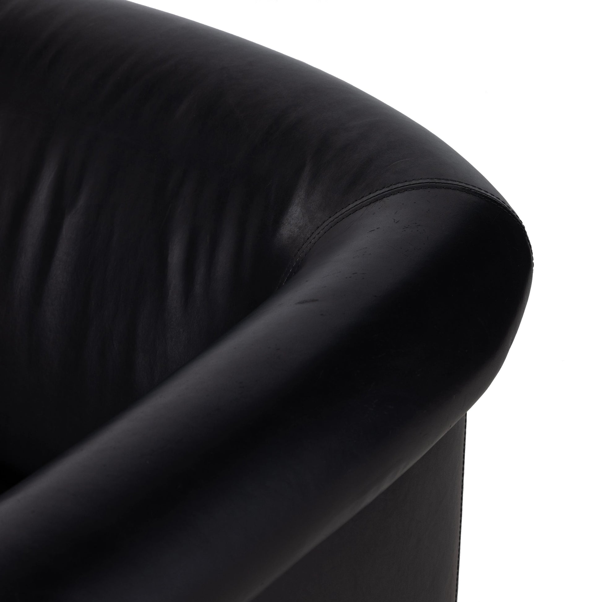 Colby Swivel Chair by Four Hands in vintage ash veneer, heirloom black, vintage ash. Made from top grain leather, ash veneer, solid ash in a modern style.