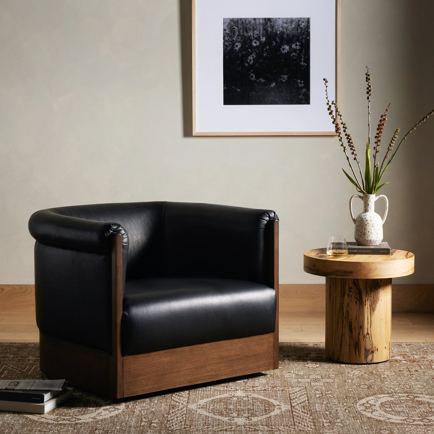003 SI-1977210 | Lifestyle | Colby Swivel Chair by Four Hands in vintage ash veneer, heirloom black, vintage ash. Made from top grain leather, ash veneer, solid ash in a modern style.