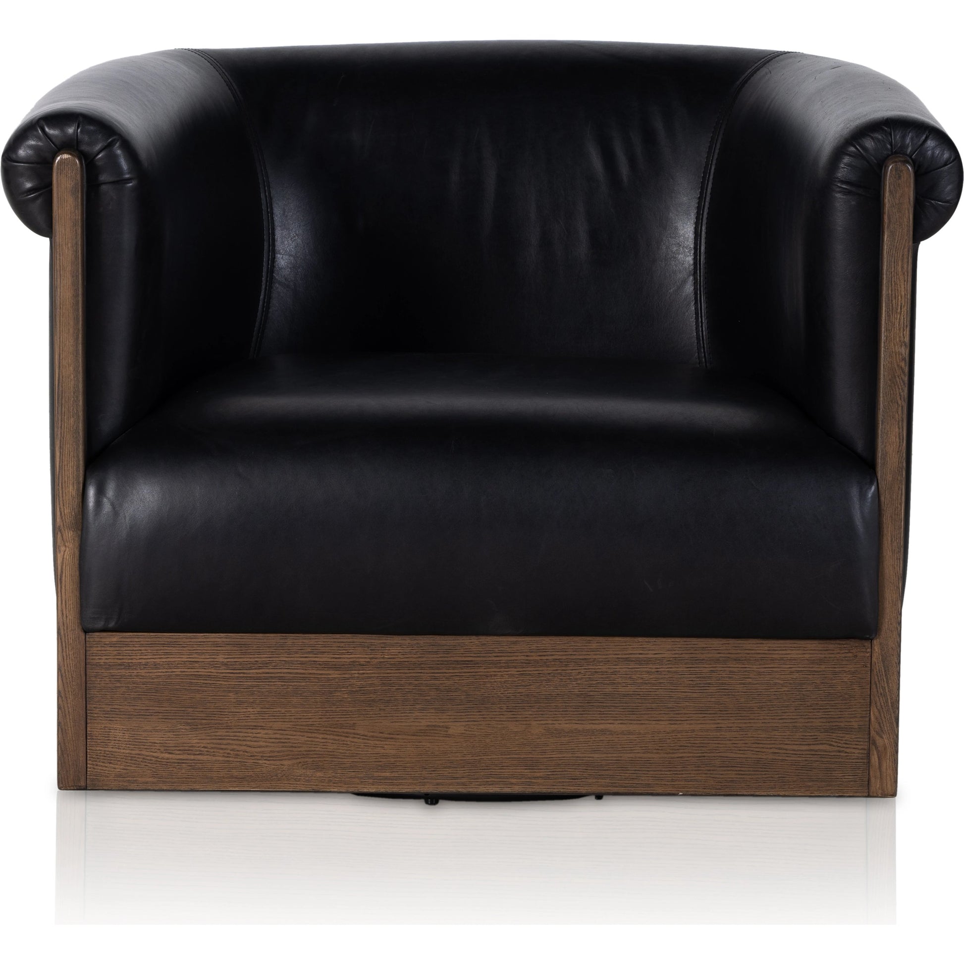 Colby Swivel Chair by Four Hands in vintage ash veneer, heirloom black, vintage ash. Made from top grain leather, ash veneer, solid ash in a modern style.