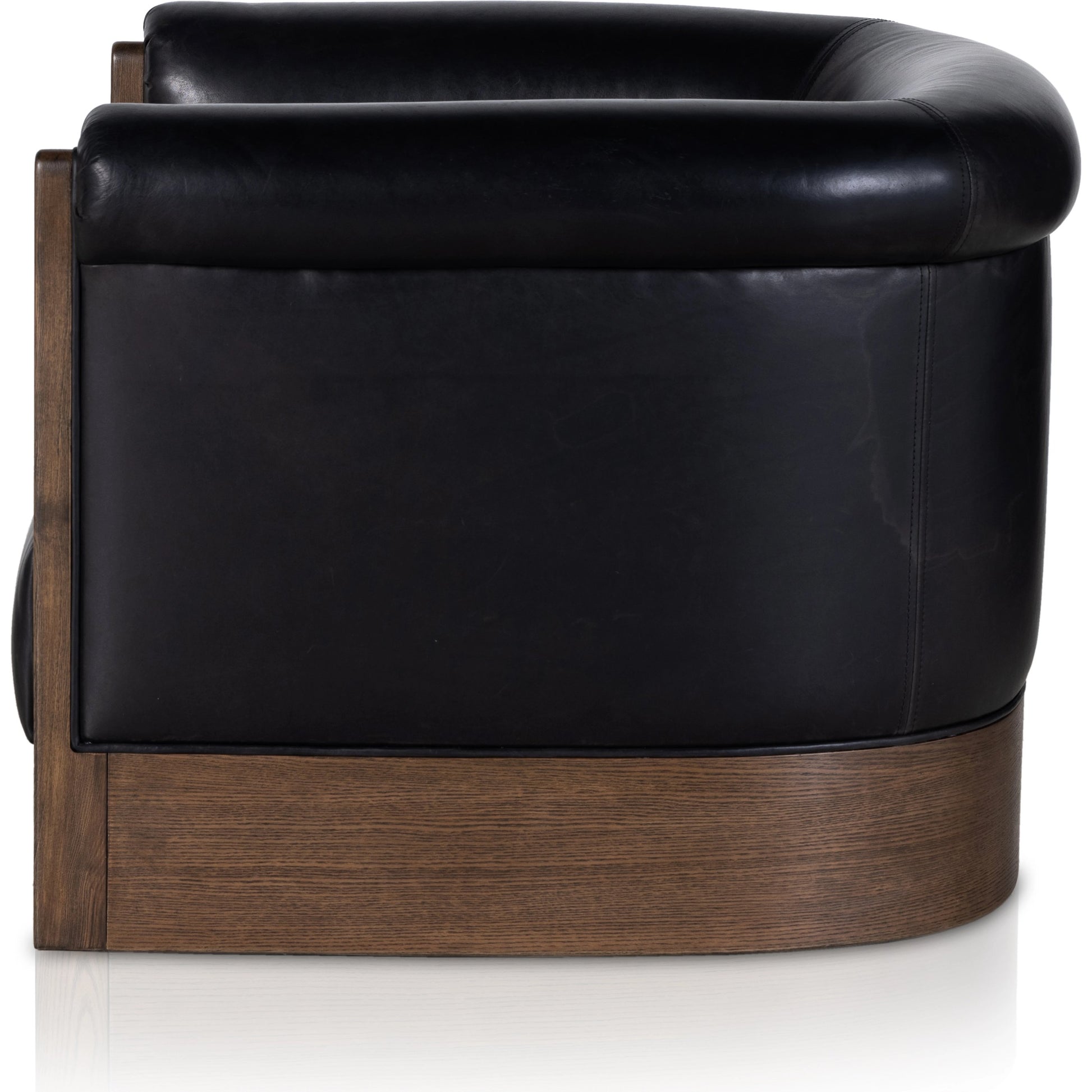 Colby Swivel Chair by Four Hands in vintage ash veneer, heirloom black, vintage ash. Made from top grain leather, ash veneer, solid ash in a modern style.