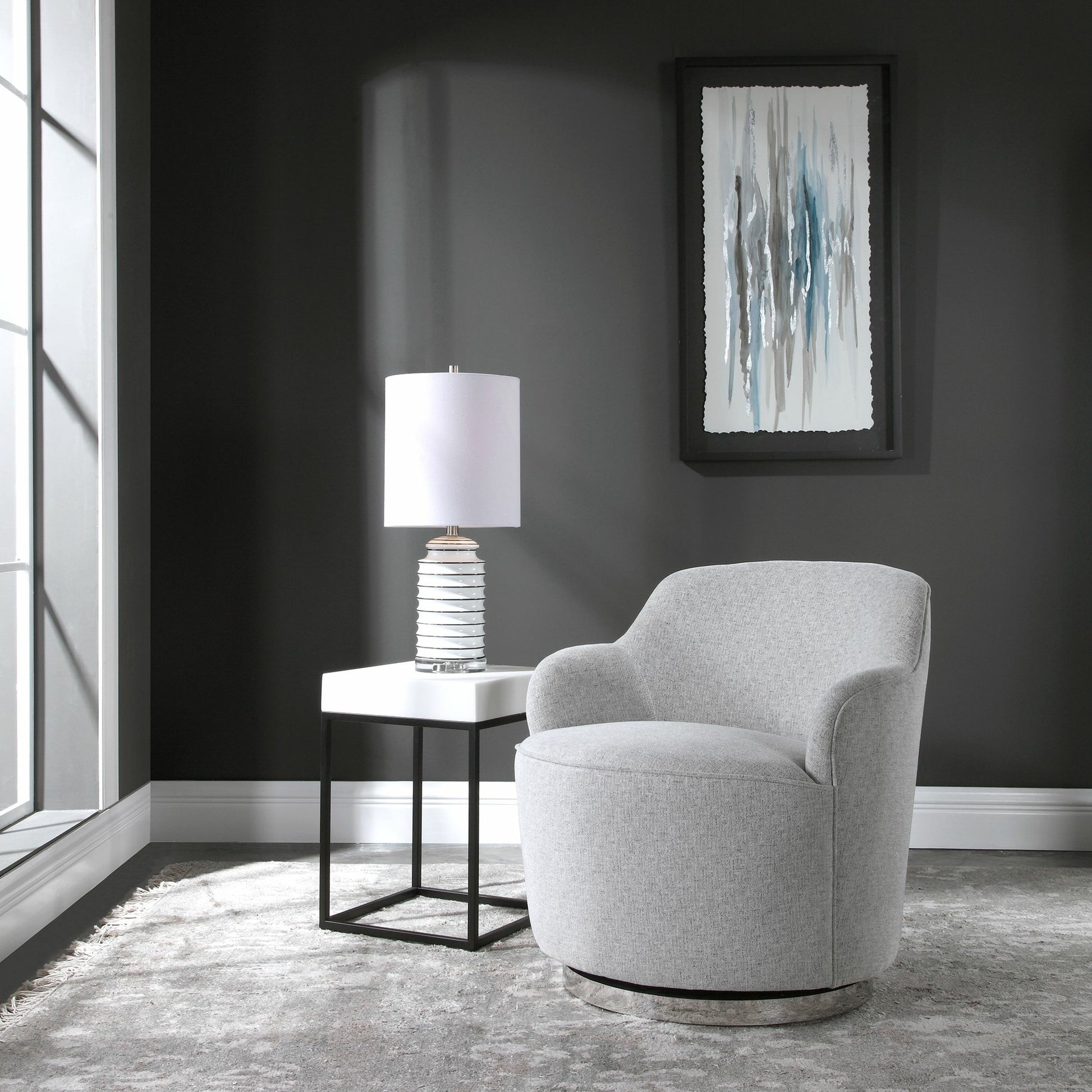 Hobart Casual Swivel Chair by Uttermost. Made from plywood, stainless steel, fabric, foam in a modern style.
