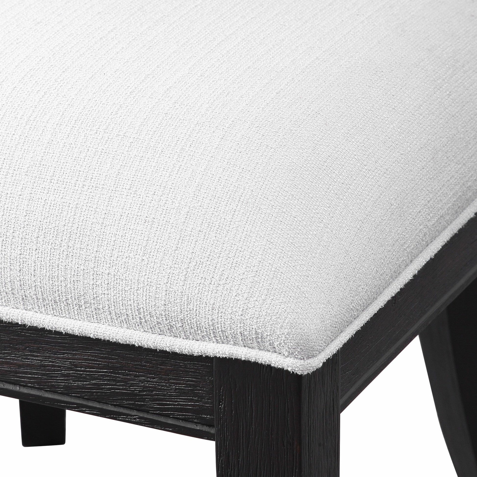 Idris Armless Chair by Uttermost. Made from birch solid wood, bent wood, plywood, foam, fabric in a modern style.