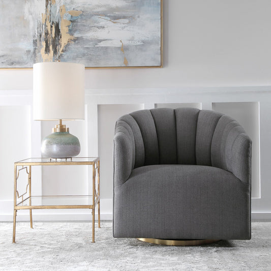 Cuthbert Modern Swivel Chair by Uttermost. Made from stainless steel, plywood, hardwood, foam, fabric in a transitional style.