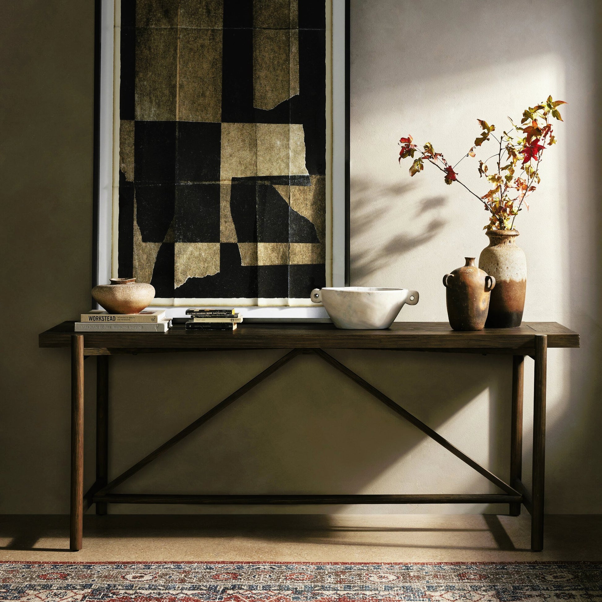 Goldthwaite Console Table by Four Hands in sienna brown. Made from solid pine, poplar plywood in a modern style.