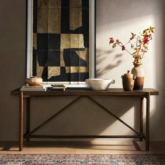 Goldthwaite Console Table by Four Hands in sienna brown. Made from solid pine, poplar plywood in a modern style.