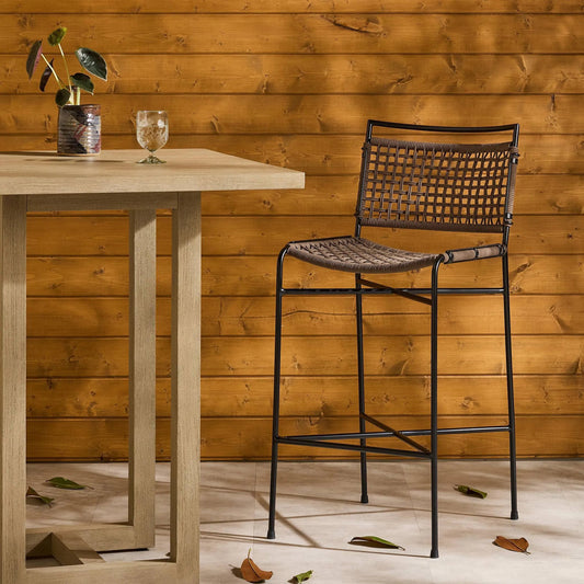 Wharton Outdoor Bar Stool by Four Hands in black rope and satin black. Made from iron, 100% polyester in a modern style.