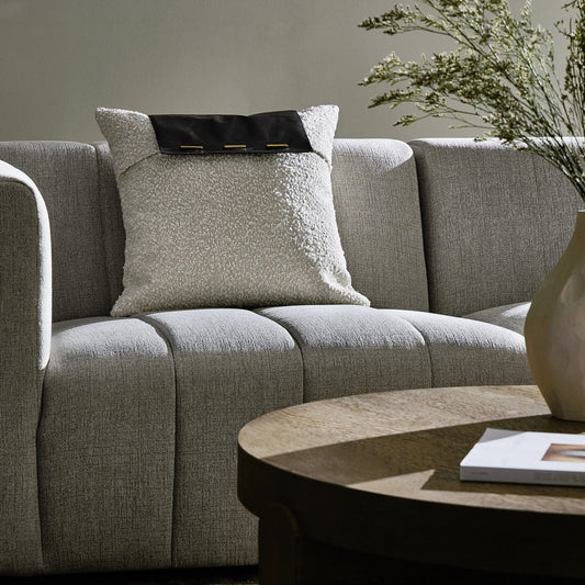 Boucle and Leather Pillow by Four Hands in white. Made from 95% polyester, 5% acrylic, top grain leather, down alternative fiber in a eclectic & global style.