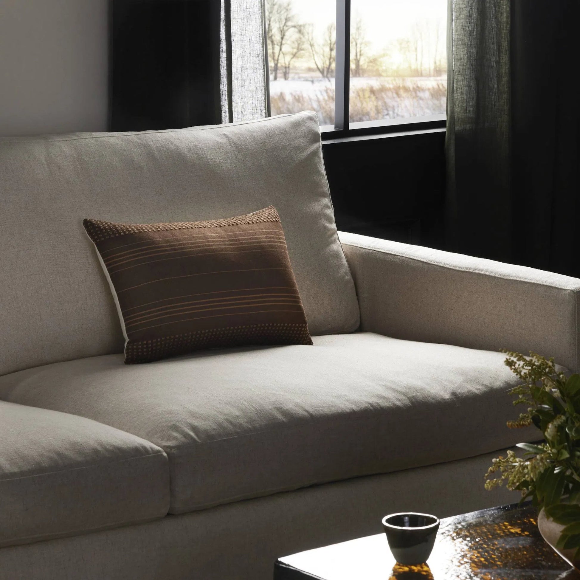 Handwoven Cancuc Pillow by Four Hands in taupe cotton, off white canvas, mocha cotton. Made from 100% cotton in a unique style.