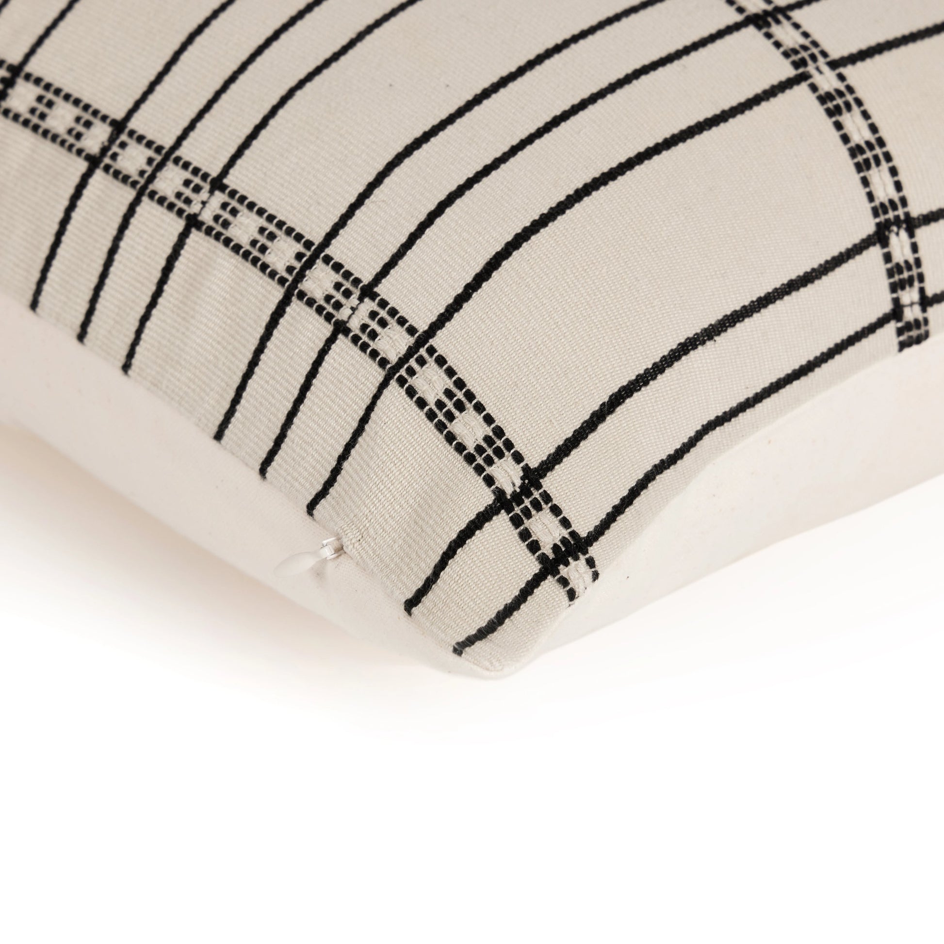 Handwoven Chiapas Pillow by Four Hands in ivory cotton, off white canvas, black cotton and ivory cotton. Made from 100% cotton in a transitional style.