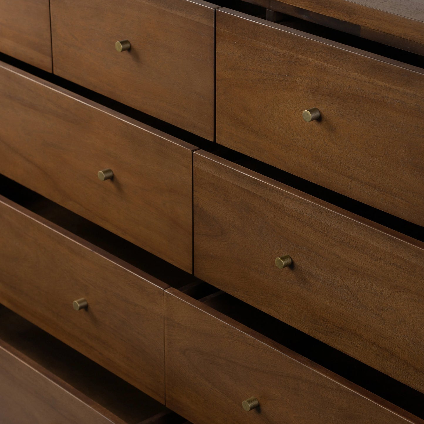 010 SI-2074751 | Closeup | Sullivan 10 Drawer Dresser by Four Hands in saddle tan. Made from solid acacia, thin acacia veneer in a modern style.