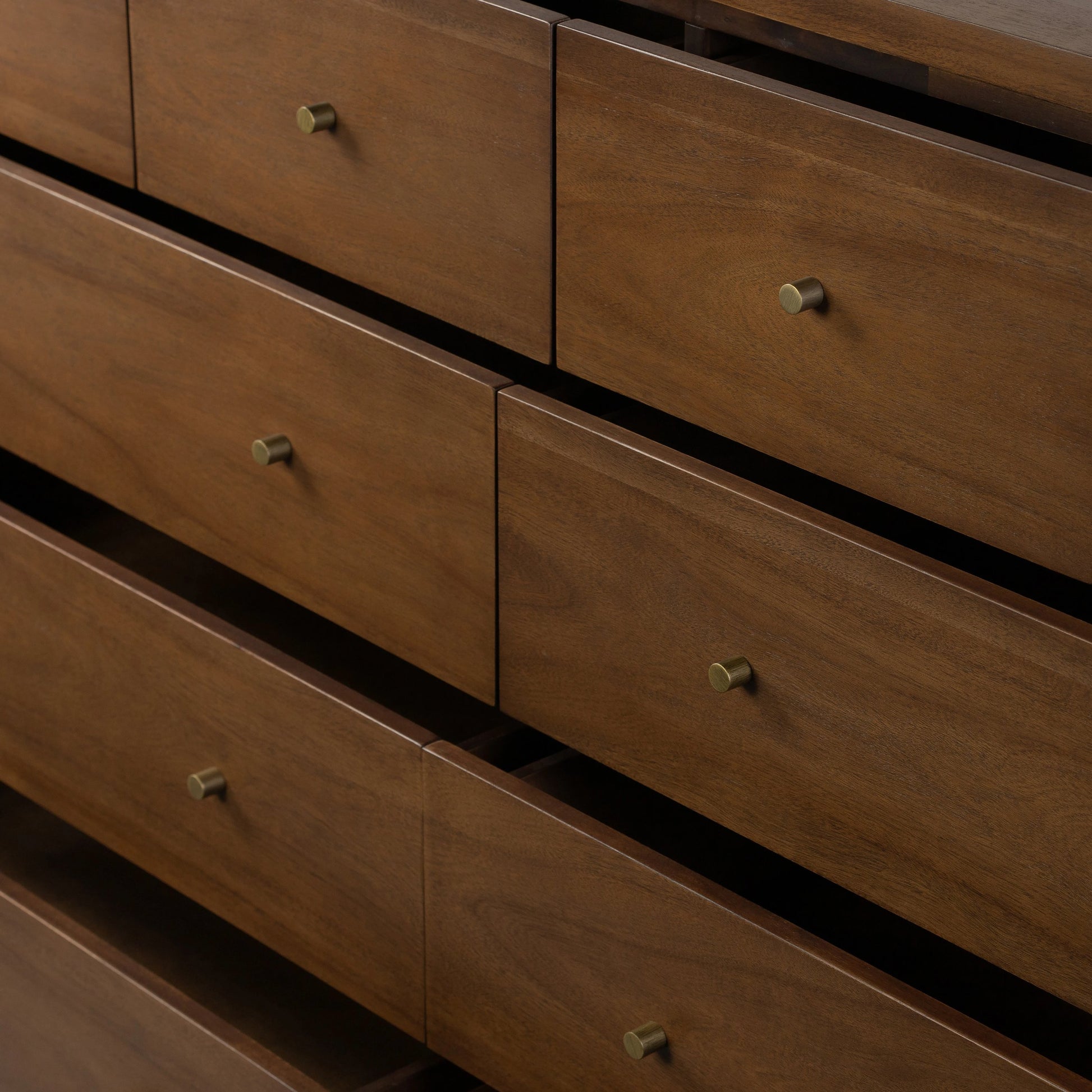 Sullivan 10 Drawer Dresser by Four Hands in saddle tan. Made from solid acacia, thin acacia veneer in a modern style.
