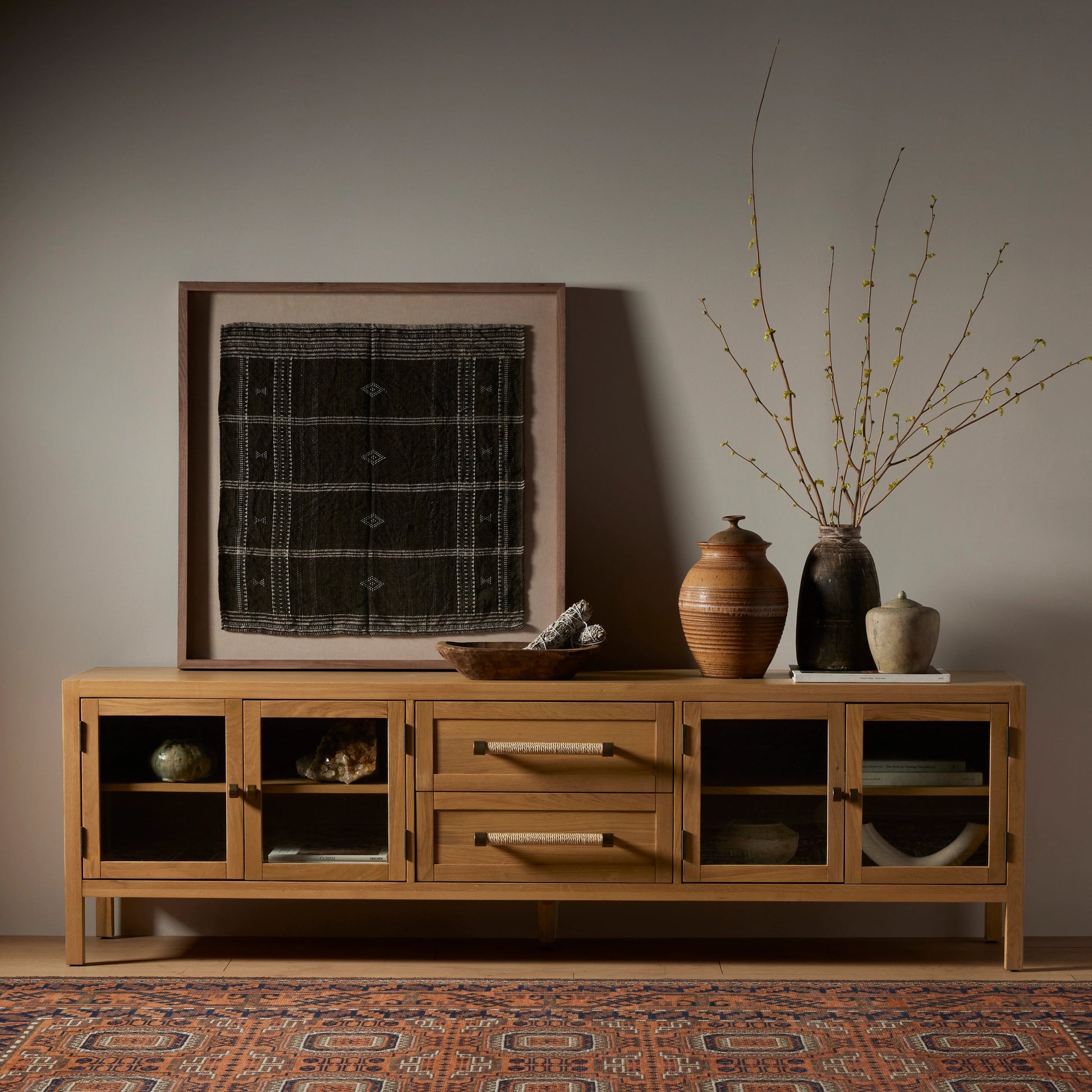 Laker Media Console by Four Hands in black oak. Made from solid oak, rush, oak veneer in a modern style.