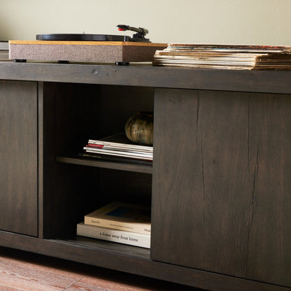 Laredo Media Console by Four Hands in smoked black. Made from solid oak, thick oak veneer in a modern style.