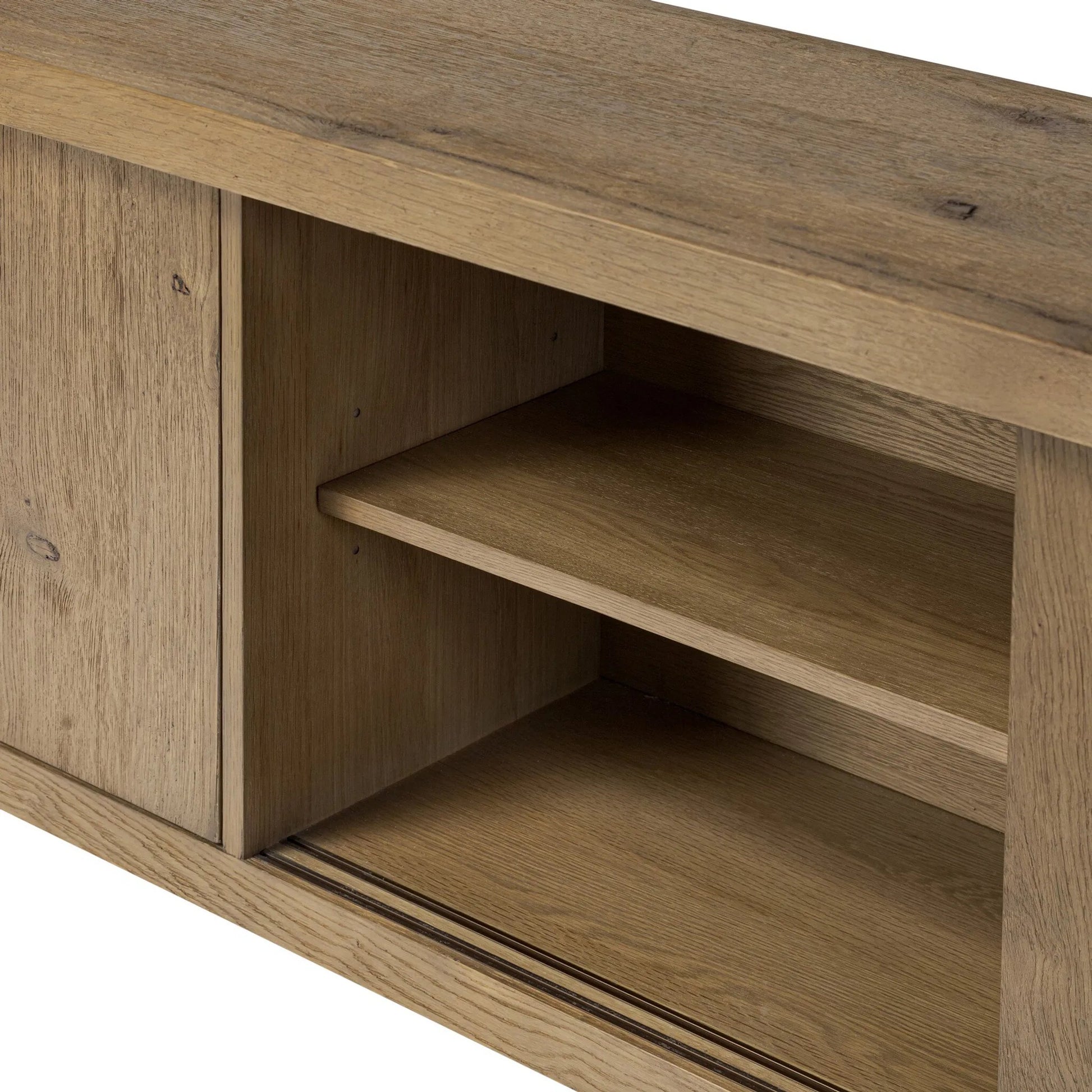 Laredo Media Console by Four Hands in smoked black. Made from solid oak, thick oak veneer in a modern style.