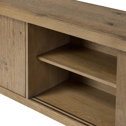 Laredo Media Console by Four Hands in smoked black. Made from solid oak, thick oak veneer in a modern style.