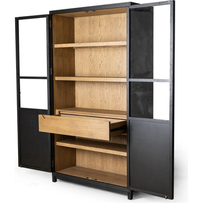 Millie Panel & Glass Door Cabinet by Four Hands in drifted matte black. Made from solid oak, oak veneer in a modern style.