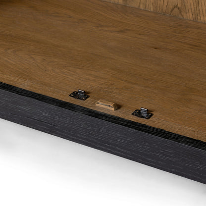 Millie Panel & Glass Door Cabinet by Four Hands in drifted matte black. Made from solid oak, oak veneer in a modern style.