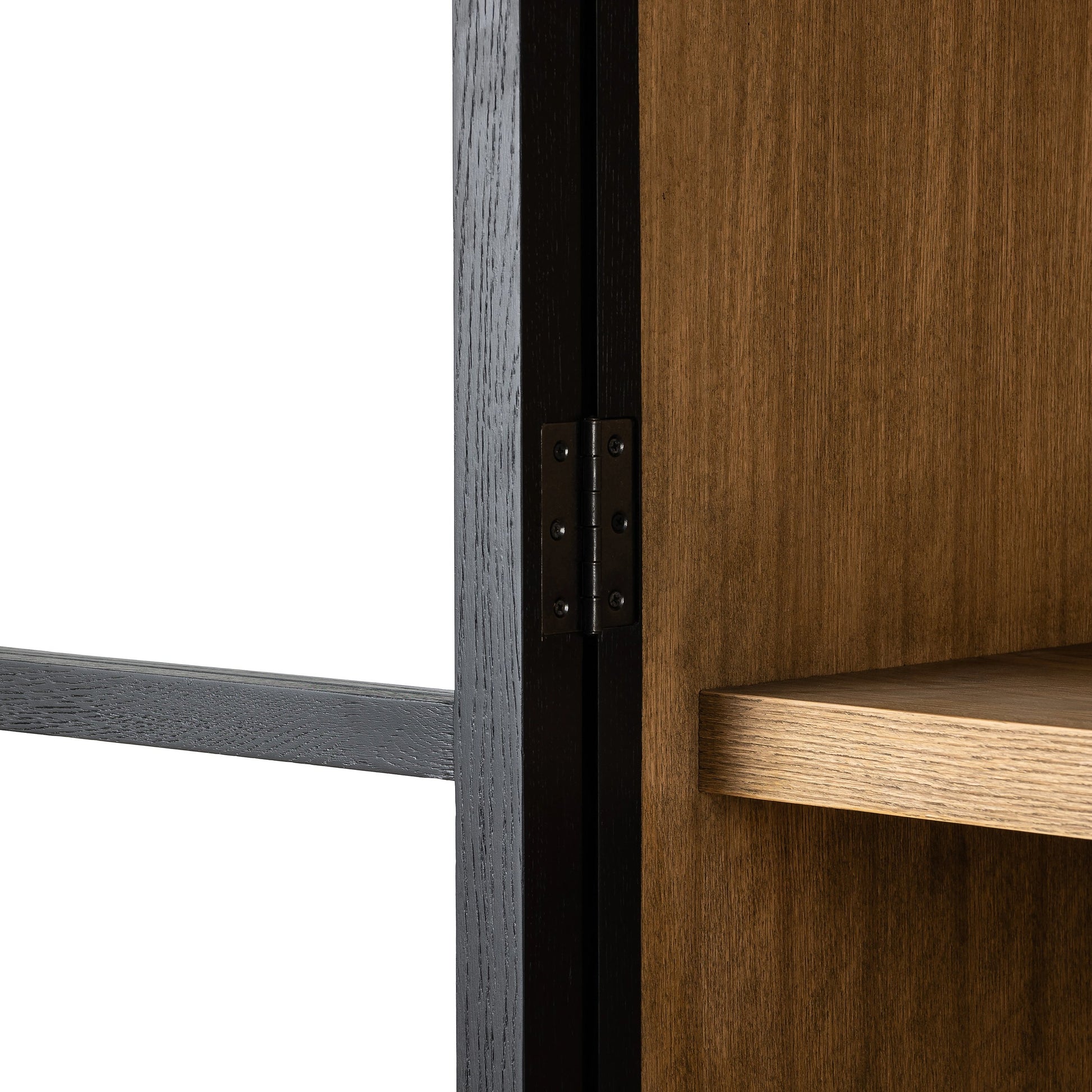 Millie Panel & Glass Door Cabinet by Four Hands in drifted matte black. Made from solid oak, oak veneer in a modern style.