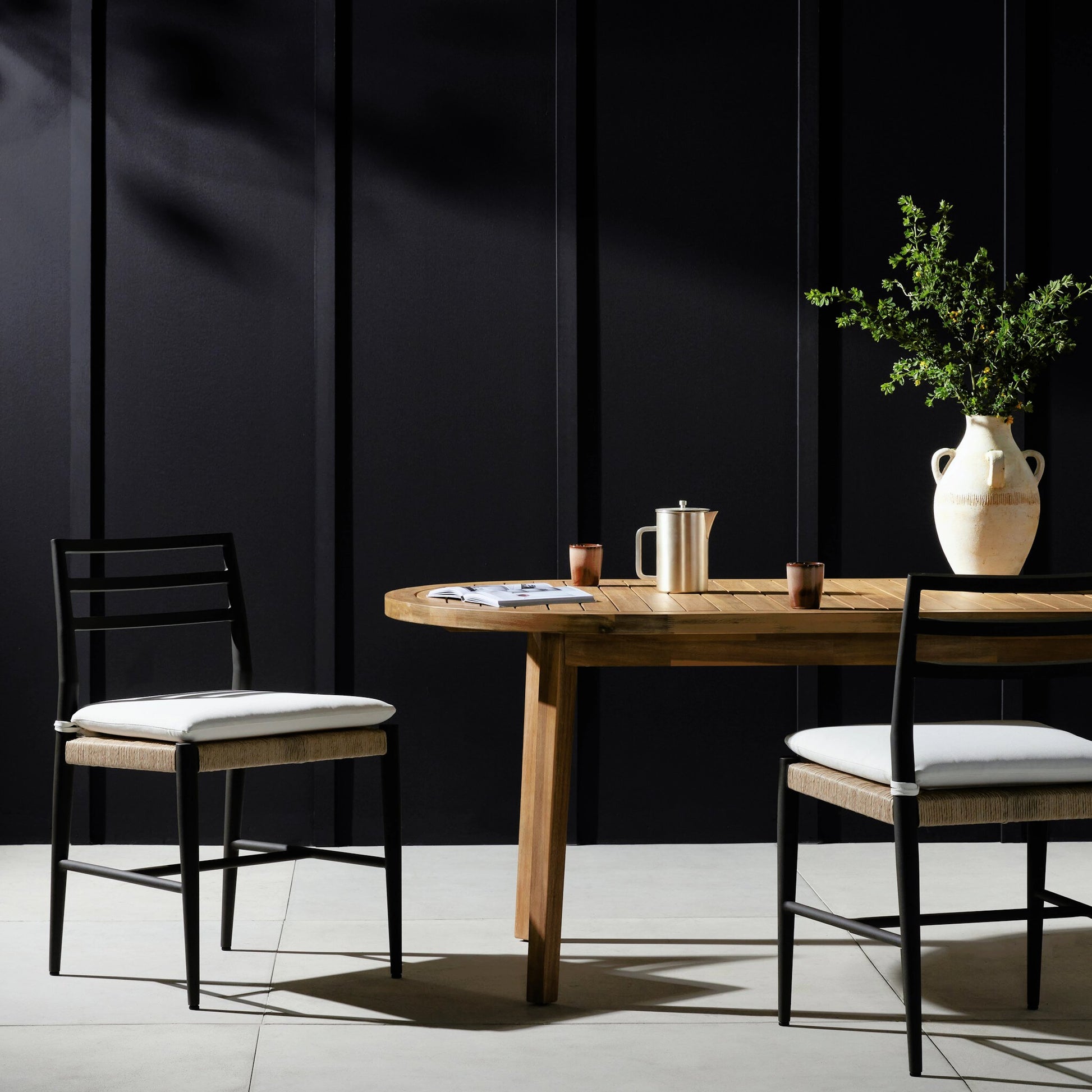 Glenmore Outdoor Dining Chair w/ Cushion by Four Hands in stinson white, bronze. Made from 100% olefin, aluminum, 100% polyethylene in a modern style.