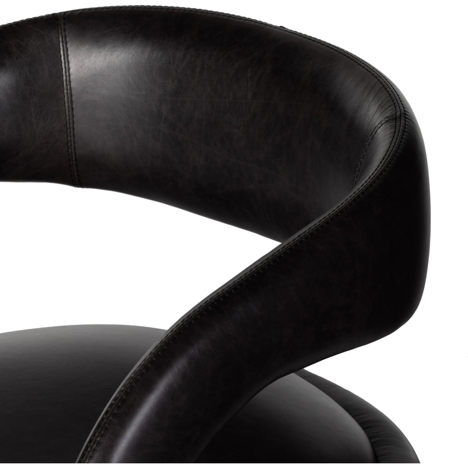Hawkins Swivel Chair by Four Hands in sonoma butterscotch. Made from top grain leather, poplar plywood, 100% polyester in a modern style.